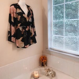 Flowing floral romper.